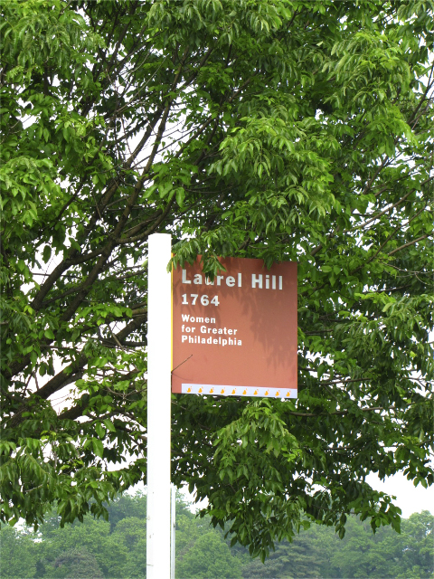 Wooden Park sign pointing the way to Laurel Hill Mansion in Philadelphia PA
