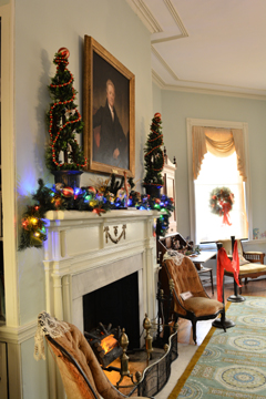 side view of the mantel in the great room at Philadelphia Park house Laurel Hill Mansion decorated for the holidays