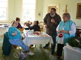 Volunteers from Women For Greater Philadelphia and others making ornaments at Laurel Hill Mansion for the 2022 winter holidays.