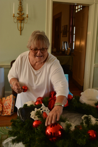 Volunteers from Women For Greater Philadelphia and others making ornaments at Laurel Hill Mansion for the 2022 winter holidays.