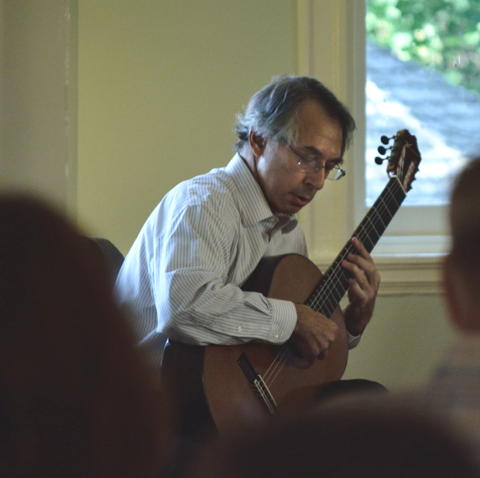Renown classical guitarist Allen Krantz performing in the octagonal room at historic Laurel Hill Mansion in Philadelphia PA as part of the 2014 Summer concert series held there. 