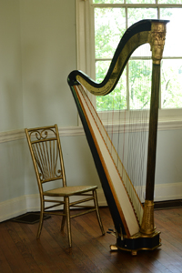 In the famous octagon room of Laurel Hill Mansion the site of the summer music series Concerts by Candlelight sits a beautiful harp.