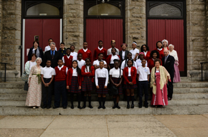 Participating 7th and 8th grade students and teachers, the Principal and Librarian from Holy Cross School in Mt. Airy pose with lawyer Scott Griffiths from The Rawle &amp; Henderson Law Firm and volunteers from Women for Greater Philadelphia at symposium on the constitution a program of Women for Greater Philadelphia's education committee.