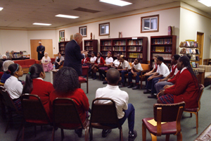 Students from Holy Cross School gather in a circle at the constitution program