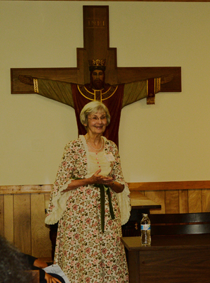 Chairwomen Betty Young of the Education committee of Women for Greater Philadelphia addresses students and teachers from the Holy Cross School in PHiladelphia