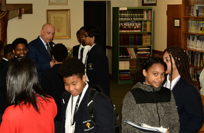 Students and lawyertalk during a program break